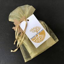 Leaf: comes in a gold organza bag with Muddy Waters Art label
